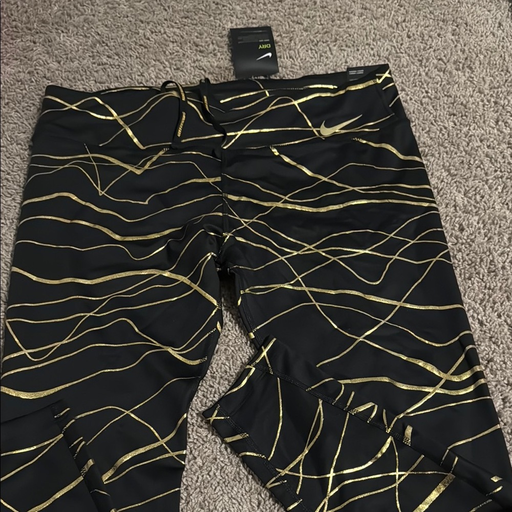 Nike Black Leggings with Gold Pattern